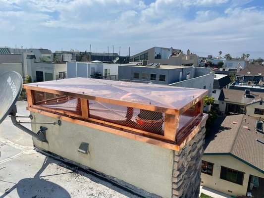 Custom Made Copper Chimney Cap And Shroud With Chase Cover - Elevating the allure of a four-story condo in Santa Monica, our team orchestrated a captivating project. Picture this: a custom-made copper chimney cap and shroud, meticulously crafted to not only enhance aesthetics but also to ensure optimal functionality. The pièce de résistance? A strategically installed Chase Cover, seamlessly integrated into the architectural landscape.
The logistics were as impressive as the final result. Employing precision and expertise, we utilized a lift to transport and delicately position the custom creations atop the condo. This meticulous process not only showcased our commitment to detail but also emphasized our dedication to executing projects seamlessly, even in challenging environments.
At Chimney Sweep Masters, we turn architectural aspirations into reality, bringing a blend of artistry and functionality to every project. The Santa Monica condo now stands as a testament to our craftsmanship, where custom copper elements meet the heights of sophistication. Experience the pinnacle of design with us – where each project is a testament to our commitment to excellence. Custom Made Copper Chimney Cap And Shroud With Chase Cover - Elevating the allure of a four-story condo in Santa Monica, our team orchestrated a captivating project. Picture this: a custom-made copper chimney cap and shroud, meticulously crafted to not only enhance aesthetics but also to ensure optimal functionality. The pièce de résistance? A strategically installed Chase Cover, seamlessly integrated into the architectural landscape.
The logistics were as impressive as the final result. Employing precision and expertise, we utilized a lift to transport and delicately position the custom creations atop the condo. This meticulous process not only showcased our commitment to detail but also emphasized our dedication to executing projects seamlessly, even in challenging environments.
At Chimney Sweep Masters, we turn architectural aspirations into reality, bringing a blend of artistry and functionality to every project. The Santa Monica condo now stands as a testament to our craftsmanship, where custom copper elements meet the heights of sophistication. Experience the pinnacle of design with us – where each project is a testament to our commitment to excellence.