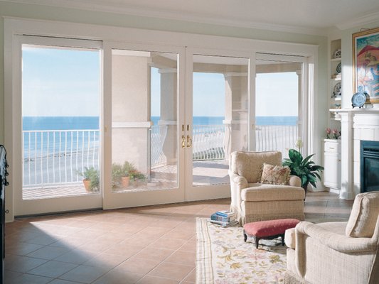 Patio Doors / French Doors / Sliding Glass Doors - Renewal by Andersen patio doors are beautiful, long-lasting, and secure. We offer several style choices depending on your preference for sliding or hinged doors, and a modern or more classic look. Further customize your new patio door with a thoughtful array of hardware and finish choices. Our patio doors are designed for the way you live, and are available in 3 standard styles to best complement your Oklahoma City home.

Our patio doors are designed for the way you live, and feature:
• Climate-neutral performance
• Easy operation even in the toughest of climates
• Energy-efficient design - continuous weatherstripping and interlocking design features help keep your home draft-free and provide energy savings, too
• Solid, secure construction - multiple locking points offer an added level of security