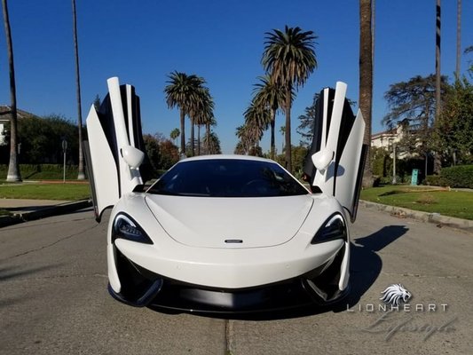 McLaren 570s (White) - There are three members of the 570 family, and all are set to kick sand in the faces of lesser cars. There’s the 570S, the 570S Spider, and the 570GT; the S models are sportiest, while the GT is for long-distance-driving comfort. All have a 562-hp twin-turbo 3.8-liter V-8 mounted behind the cabin; a carbon-fiber tub reduces weight and adds strength. A seven-speed dual-clutch transmission drives the rear wheels. The S models are marginally quicker to 60 mph, but all have a top speed of 204 mph.