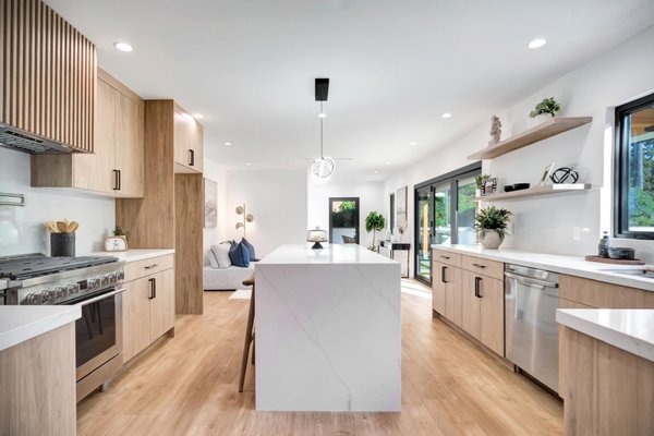 Kitchen Remodel - This remodel was done on an old kitchen that was in bad shape. The rest of the house had been updated, so the kitchen stuck out like a sore thumb. We gutted it and put in new cabinets and appliances to match the overall tone of the house.