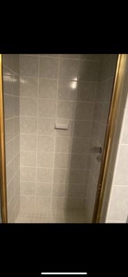 Moldy Shower Regrouting - This Shower enclosure had absolutely no ventilation in or around it, and was no cleaned or sealed regularly to keep the mold at bay. I had to drill it all out, and replace it. Sealants can be mixed into the grout, but you must keep sealing it if you want to preserve its color, otherwise the grout will absorb the dirty water, minerals, and soaps, that will stain the grout over time.