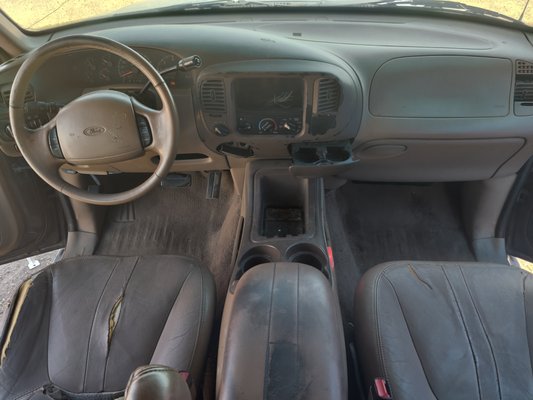 Older utility vehicle - This SUV was used in the ways a utility vehicle was born to, but it had also seen years of neglect. No car is too old or worn down to have a little love put back into it. Years of grease, dog hair, and hay were erased.