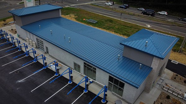 Complete metal roof - Here i wan to present you our latest commercial project. Splash car wash located in Derby. Besides the roof we also installed here towers siding(aluminum vertical panels) snow retention bars, costume facials flashing wrap and seamless gutters 100+ feet long. Complete metal roof - Here i wan to present you our latest commercial project. Splash car wash located in Derby. Besides the roof we also installed here towers siding(aluminum vertical panels) snow retention bars, costume facials flashing wrap and seamless gutters 100+ feet long.