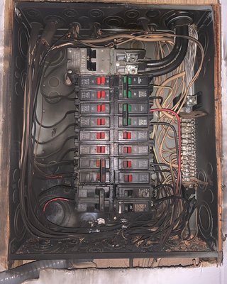 Panel relocate and replacement due to electrical fire. - This panel had to be replace and relocated to a new location due to an electrical fire. The panel was not properly maintained which created severe loose connections. Loose connection can cause arcing, which in return heats up electrical components.