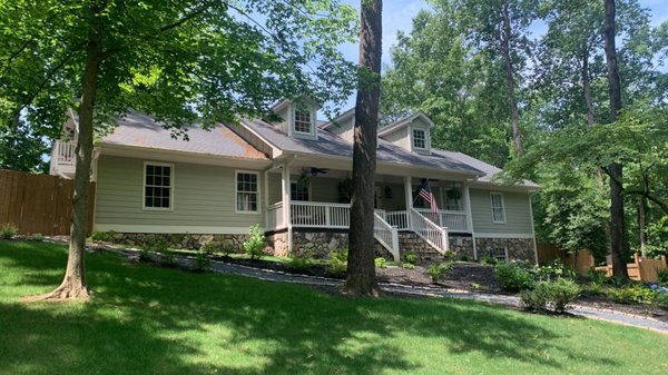 Mastershield Gutter Protection Smyrna - This Smyrna house had a severe problem with pine needles clogging the gutters.  We cleaned and adjusted the gutters and installed Mastershield Gutter Protection at the same angle as the roof to maximize debris shedding.