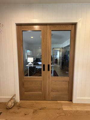 Custom pocket doors installation - The client reached out to us to install a pocket door in place of a solid wall that had existing electrical outlets and switches.

Our scope of work included full demolition, structural reinforcement of the wall and framing for the new doors, installation of a custom aluminum frame, and installation of custom wooden pocket doors. We also completed drywall installation, patching, trimming, painting, and relocation of electrical outlets and switches.

The result is a clean, seamless transition that improved both functionality and aesthetics of the space.