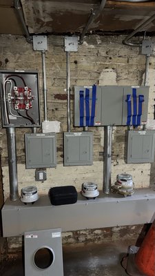 Commercial Electrical Installation – BX Cable & Panel Work - This project involved a full-scale electrical installation for a commercial property. Our team completed extensive wiring, panel assembly, and lighting work while ensuring everything met NEC code requirements.

Scope of Work:

BX Cable Installation
• Installed approx. 10,000 ft of BX armored cable for branch circuits.
• Pulled circuits for receptacles, lighting, and switches as per design layout.
• Secured BX with straps and connectors according to NEC code.

Main Panel & Subpanels Assembly
• Assembled and terminated the main distribution panel.
• Installed and wired multiple subpanels with proper grounding and bonding.
• Connected feeders from the main panel to subpanels with correct conduit and wire sizing.

Switches & Receptacles
• Installed and connected all general-purpose receptacles.
• Mounted and wired light switches in designated areas.
• Verified correct wiring of neutrals, grounds, and hot conductors.

Lighting Circuits
• Installed and connected lighting circuits across the premises.
• Completed rough-in with BX, box installation, and fixture wiring.
• Tested continuity and confirmed compliance with load requirements.