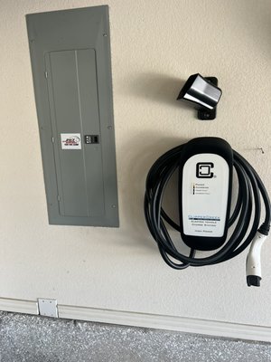 EV Charging Installation - Switching to an electric vehicle can help reduce your reliance on oil and help you do your part to reduce your carbon footprint and reduce global warming. However, an EV charging outlet, port or station can put a strain on older electrical systems. Our electricians work with homeowners to ensure that their system can handle their preferred EV charging system, while also ensuring that the charging option is properly installed so that it does not damage your new electric vehicle. EV Charging Installation - Switching to an electric vehicle can help reduce your reliance on oil and help you do your part to reduce your carbon footprint and reduce global warming. However, an EV charging outlet, port or station can put a strain on older electrical systems. Our electricians work with homeowners to ensure that their system can handle their preferred EV charging system, while also ensuring that the charging option is properly installed so that it does not damage your new electric vehicle.