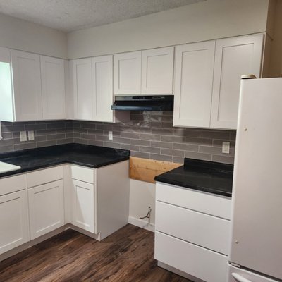 Kitchen + Bathroom Remodel - Recently completed remodel. New kitchen, new walk in shower, new pantry built, new LVP flooring, new baseboards and fresh paint.