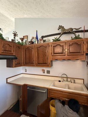 Greenwood Kitchen Refresh - We took this outdated kitchen and brought it up to par with current trends! Brand new Quartz countertops, new tile backsplash, new undermount sink and new faucet. The customer was thrilled with the finished project and couldn’t BELIEVE how $ budget $ friendly the cost was. Call us TODAY to consult about your project! Greenwood Kitchen Refresh - We took this outdated kitchen and brought it up to par with current trends! Brand new Quartz countertops, new tile backsplash, new undermount sink and new faucet. The customer was thrilled with the finished project and couldn’t BELIEVE how $ budget $ friendly the cost was. Call us TODAY to consult about your project!