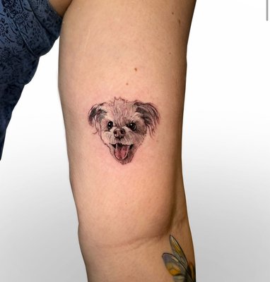Micro Best Friend (animal) Tattoos - Here’s an updated description highlighting Dan’s expertise:

Micro Animal & Pet Portrait Tattoos by Dan

At [Your Tattoo Shop Name], we know that pets are family, and our talented artist Dan specializes in capturing their unique charm with micro animal tattoos. With a meticulous eye for detail, Dan creates lifelike, miniature portraits that reflect the character and love of your furry friends, bringing even the smallest features to life in delicate tattoos.

From tiny expressions to distinctive markings, Dan’s expertise in micro tattoos makes each piece personal and memorable. Whether you want a subtle tribute or a fine-detail piece of your pet, Dan is here to create a tattoo that carries their spirit with you always. Book a consultation with Dan to design a custom pet portrait you’ll cherish forever.