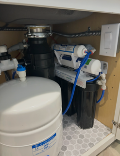 Reverse Osmosis Installation - Did you know that an RO (Reverse Osmosis) system uses a process that removes contaminants from water by using pressure to force water molecules through a semipermeable membrane? During the process, contaminants are filtered out and flushed away leaving you with delicious, clean drinking water! Call Phillips Plumbing Solutions today! We would love to help your family experience fresh clean drinking water! Reverse Osmosis Installation - Did you know that an RO (Reverse Osmosis) system uses a process that removes contaminants from water by using pressure to force water molecules through a semipermeable membrane? During the process, contaminants are filtered out and flushed away leaving you with delicious, clean drinking water! Call Phillips Plumbing Solutions today! We would love to help your family experience fresh clean drinking water!