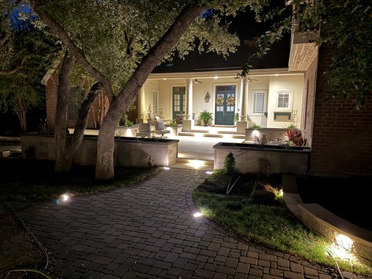 Modern Courtyard Hardscape & Planter Installation - This project involved a full courtyard transformation, including trenching and rough-in work to set structural footers for raised planters and patio dimensions. Custom raised planters were constructed using Artforms concrete blocks, followed by the installation of a porcelain tile patio. Electrical rough-ins were completed for future lighting, with final layout designed to integrate hardscape, planting areas, and circulation seamlessly. The result is a refined, modern courtyard built for durability, function, and long-term aesthetic impact. Modern Courtyard Hardscape & Planter Installation - This project involved a full courtyard transformation, including trenching and rough-in work to set structural footers for raised planters and patio dimensions. Custom raised planters were constructed using Artforms concrete blocks, followed by the installation of a porcelain tile patio. Electrical rough-ins were completed for future lighting, with final layout designed to integrate hardscape, planting areas, and circulation seamlessly. The result is a refined, modern courtyard built for durability, function, and long-term aesthetic impact.