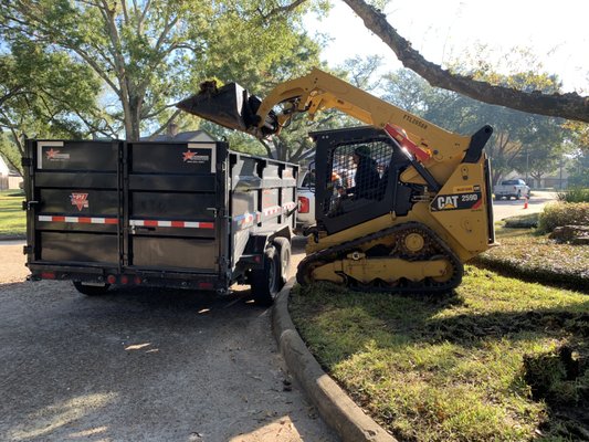 Grading & Sodding - This project was located in the the memorial area. As per request from client we removed 3'' of subsoil Grading & Sodding - This project was located in the the memorial area. As per request from client we removed 3'' of subsoil