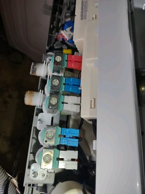 New washer valves - Replaced the washer valves because washer hoses would not thread on correctly with out leaking New washer valves - Replaced the washer valves because washer hoses would not thread on correctly with out leaking