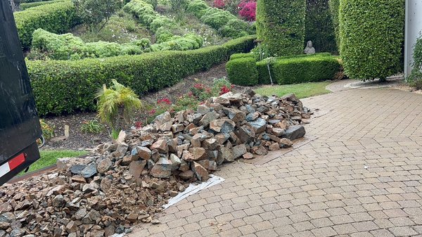 Rock Removal/Hauling - Project Highlight: Rock Mountain Removal
For this recent project, Saints Junk Removal & Hauling was hired to remove and haul away a large rock formation from a client’s property as part of a final phase in her landscaping project. The job required two full truckloads, with each load estimated to weigh between 3 to 5 tons.
Our team began the job at 9:00 AM and completed it by 3:30 PM, including time for breaks and lunch. It was a physically demanding, full-day effort that showcased the strength, reliability, and dedication of our crew.
This project is a great example of the heavy-duty work we’re equipped to handle at Saints Junk Removal & Hauling. Whether it’s rock removal, demolition debris, or any other tough job—no task is too big for our team.
If you or someone you know needs dependable junk removal or hauling services, feel free to give us a call at 760-224-8448. We’re here to help! Rock Removal/Hauling - Project Highlight: Rock Mountain Removal
For this recent project, Saints Junk Removal & Hauling was hired to remove and haul away a large rock formation from a client’s property as part of a final phase in her landscaping project. The job required two full truckloads, with each load estimated to weigh between 3 to 5 tons.
Our team began the job at 9:00 AM and completed it by 3:30 PM, including time for breaks and lunch. It was a physically demanding, full-day effort that showcased the strength, reliability, and dedication of our crew.
This project is a great example of the heavy-duty work we’re equipped to handle at Saints Junk Removal & Hauling. Whether it’s rock removal, demolition debris, or any other tough job—no task is too big for our team.
If you or someone you know needs dependable junk removal or hauling services, feel free to give us a call at 760-224-8448. We’re here to help!