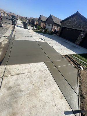 Driveway approach expansion  - This client wanted to expand their driveway approach, so that way they would not hit the curb when entering. We pulled permits with the city of Tulare. Driveway approach expansion  - This client wanted to expand their driveway approach, so that way they would not hit the curb when entering. We pulled permits with the city of Tulare.