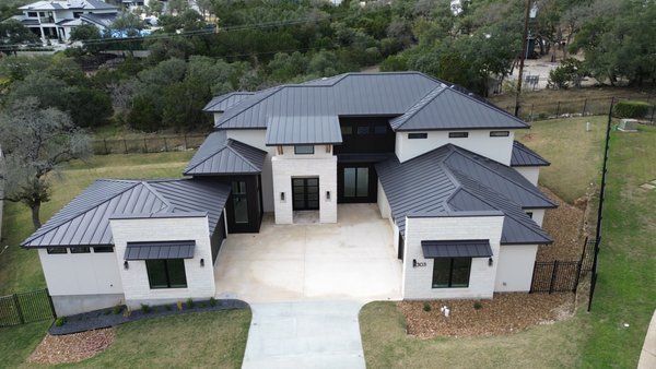 Standing Seam Metal Roofing - Standing seam metal roofing is well known for its strength, long lasting life span, and beautiful curb appeal. It doesn't cost to install a metal roof it pays! Up to 50 years of a life expectancy!