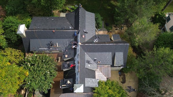 Eco-Star Synthetic Slate - This project in Potomac, MD, features an Eco-Star Synthetic Slate installation, carefully done in a staggered pattern for an eye-catching and refined look Eco-Star Synthetic Slate - This project in Potomac, MD, features an Eco-Star Synthetic Slate installation, carefully done in a staggered pattern for an eye-catching and refined look