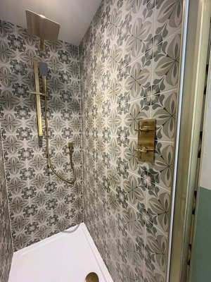 Bathroom Remodel. Farm house look - This bathroom was completly redone. We gave it a new farm house look. with printed tile, flooring, wood vanity, and vessel sink. Came out outstanding Bathroom Remodel. Farm house look - This bathroom was completly redone. We gave it a new farm house look. with printed tile, flooring, wood vanity, and vessel sink. Came out outstanding