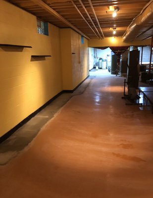Interior Basement Waterproofing in Canfield, OH and miscellaneous photos throughout the last 25+ years! - This interior waterproofing job was completed for a customer in Canfield Ohio. Consisted of 300+ feet of new 4” SDR35 PVC perforated footer drains and 3 1HP sump pumps. Finished job in one week.