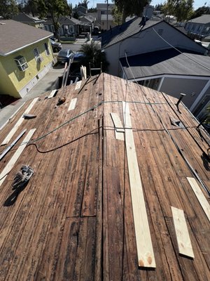Garage reroof - We removed 4 layers of shingles and fixed the damaged wood. New shingles were installed. Garage reroof - We removed 4 layers of shingles and fixed the damaged wood. New shingles were installed.