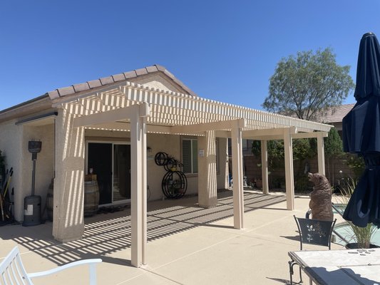 Needing more shade in backyard. - Homeowner wanted to extend his existing built in cover, installed a beautiful lattice cover to give that extra shade that was needed. Needing more shade in backyard. - Homeowner wanted to extend his existing built in cover, installed a beautiful lattice cover to give that extra shade that was needed.
