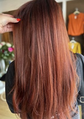 All over color - This client came in with dull faded hair wanting to have a color that was more vibrant and eye catching and our stylist did a fabulous job creating this new look for her! Talk about a transformation!