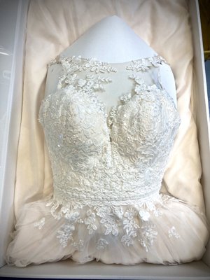 Wedding Gown Preservation - When a client leaves us with their wedding gown, we don’t take it lightly. At drop-off we will carefully go over the entire gown with our client to make sure we don’t miss anything. Our cleaning process takes time because we meticulously treat each area of the gown. Then we carefully steam and fold the gown into an acid free preservation box. Your gown should look just as beautiful inside the box as it did when you wore it. Now you store your gown with peace of mind. Wedding Gown Preservation - When a client leaves us with their wedding gown, we don’t take it lightly. At drop-off we will carefully go over the entire gown with our client to make sure we don’t miss anything. Our cleaning process takes time because we meticulously treat each area of the gown. Then we carefully steam and fold the gown into an acid free preservation box. Your gown should look just as beautiful inside the box as it did when you wore it. Now you store your gown with peace of mind.