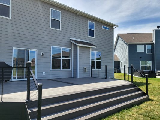 Open up your backyard - This deck was a rebuild. Cable installation for railings. Beautiful color choice. This spacious deck really opened up the comfort in this backyard