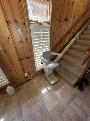 Installation of a Bruno Elan stairlift and a
Harmar Highlander wheelchair lift - This was a major project where we had to relocate the exterior stairs to properly position the wheelchair lift. We also poured a new concrete pad to ensure a stable and secure foundation for the unit. All electrical wiring was completed as part of the installation. Inside the home, we installed the stairlift with full power options, allowing the client to move freely and comfortably—and fully enjoy their beautiful cabin in the woods. Installation of a Bruno Elan stairlift and a
Harmar Highlander wheelchair lift - This was a major project where we had to relocate the exterior stairs to properly position the wheelchair lift. We also poured a new concrete pad to ensure a stable and secure foundation for the unit. All electrical wiring was completed as part of the installation. Inside the home, we installed the stairlift with full power options, allowing the client to move freely and comfortably—and fully enjoy their beautiful cabin in the woods.