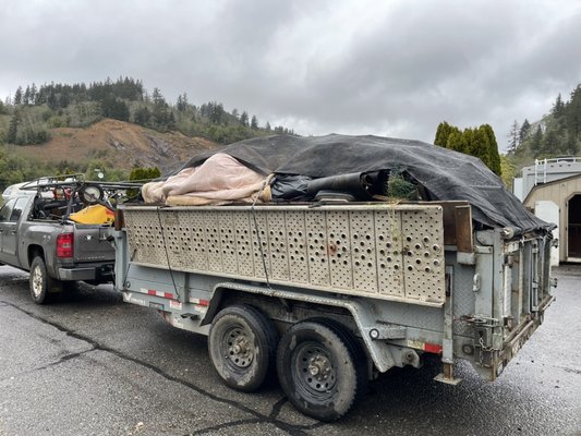 RV clean out - We removed 30 cubic yards of trash and junk from a fifth wheel RV trailer in an RV park.  The park and RV owners were very grateful.