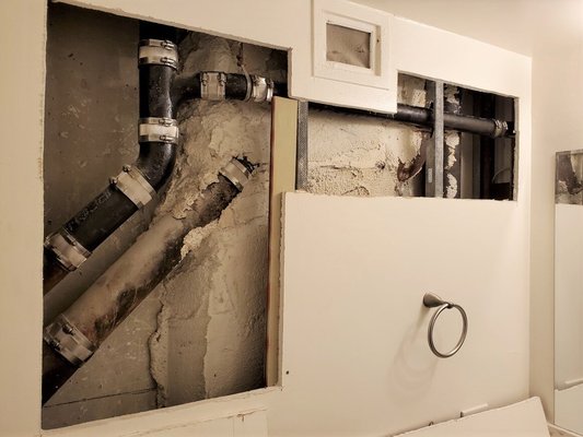 Drywall repair - I repaired the client’s bathroom drywall after plumbing work. This included installing new drywall, taping, mudding, and sanding the seams for a smooth finish. The repair was primed and prepped for painting, blending seamlessly with the original wall