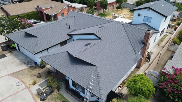 Architectural Shingle Roof Replacement - Turning a 4-Layer Roofing Challenge into a Solar-Ready Masterpiece in Arleta! 🌞🏠
When a homeowner in Arleta reached out, referred by his sister (a satisfied customer from 2018!), he had a significant project in mind—a 4,000 sq. ft. roof replacement with not one, but FOUR layers of old roofing!
We got to work with premium CertainTeed Solaris Graphite architectural shingles, perfect for reflecting sunlight and keeping the home cooler. But we didn’t stop there! He also wanted his roof solar-ready, so we prepped the structure for future solar installation.
To complete the transformation, we installed sleek, seamless aluminum black gutters for a polished look.
Tips for Homeowners:
• Layer Count Matters: If your roof has multiple layers, it’s crucial to address them before re-roofing for long-lasting results.
• Solar-Ready Roofing: Thinking of adding solar? Plan for it during your roof installation to save time and costs later.
• Trust Referrals: Your trusted friends and family can lead you to the best contractors!
We also love to thank our clients with referral fees—just like we did here. So, if you know someone looking for a roofing upgrade, send them our way!
Ready to give your home the roof it deserves? Contact us today! Architectural Shingle Roof Replacement - Turning a 4-Layer Roofing Challenge into a Solar-Ready Masterpiece in Arleta! 🌞🏠
When a homeowner in Arleta reached out, referred by his sister (a satisfied customer from 2018!), he had a significant project in mind—a 4,000 sq. ft. roof replacement with not one, but FOUR layers of old roofing!
We got to work with premium CertainTeed Solaris Graphite architectural shingles, perfect for reflecting sunlight and keeping the home cooler. But we didn’t stop there! He also wanted his roof solar-ready, so we prepped the structure for future solar installation.
To complete the transformation, we installed sleek, seamless aluminum black gutters for a polished look.
Tips for Homeowners:
• Layer Count Matters: If your roof has multiple layers, it’s crucial to address them before re-roofing for long-lasting results.
• Solar-Ready Roofing: Thinking of adding solar? Plan for it during your roof installation to save time and costs later.
• Trust Referrals: Your trusted friends and family can lead you to the best contractors!
We also love to thank our clients with referral fees—just like we did here. So, if you know someone looking for a roofing upgrade, send them our way!
Ready to give your home the roof it deserves? Contact us today!