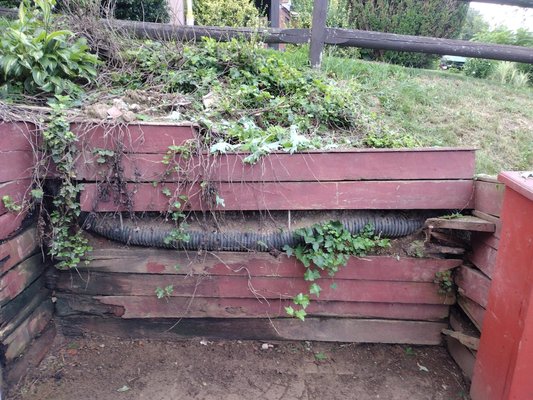 Wall update - Customer called us out about a damaged retaining wall, where he placed his garbage cans at wanted it updated. We came out tore out old wall, rerouted the drain pipe and rebuilt the wall.