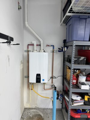 Navien 240-A2 Installation. - This was a Natural gas Bradford white tank heater with on going issues ever since home had been purchased. We replaced it with a Navien 240-A2 system with full upgrades