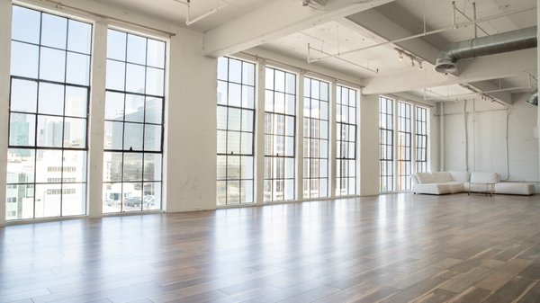 Studio E ($125/hr - 4 hour minimum) - Studio E is our large 3000 sq/ft private studio, available for $125/hr (4 hour minimum) 

Event Rates: Starting from $300/hr

Key Features:
-Incredible sunset skyline city views
-White cyclorama
-West facing floor to ceiling windows
-High gloss concrete floors
-Wood floors
-Portable makeup station
-Sectional couch
-Bluetooth speaker
-12 foot ceilings