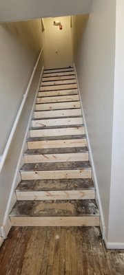 Staircase 2025 - This remodel was done in Riverside for a residential building that is over 100 years old. Although we didn't install the carpet, we did remove the old one. After, we patched, repaired, replaced, or reinforced every step. We also patched, repaired, and painted all the walls.