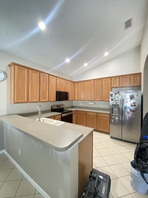 Cabinet Renovation - This remodeling was carried out on an old kitchen that was in poor condition. The rest of the house had been renovated, so the kitchen stuck out like a sore thumb. We refinished the cabinets with new paint to match the overall tone of the house. Cabinet Renovation - This remodeling was carried out on an old kitchen that was in poor condition. The rest of the house had been renovated, so the kitchen stuck out like a sore thumb. We refinished the cabinets with new paint to match the overall tone of the house.