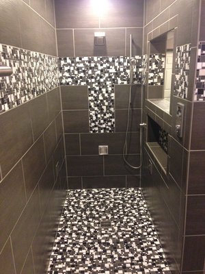 Custom Luxury Bathroom - We enjoyed creating this amazing bathroom, with all of the newest technology, smart features, and luxury style. All tile was laid by hand. I’m sure our customers will be enjoying it for many years to come!