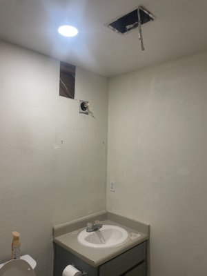 Handyman maintenance repairs - This project was done in an old restroom clients wanted an upgrade so I installed lights in there restroom and gave them more light to see in shower