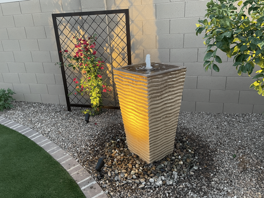 Johnson Project in Ovation 2025 - This project was about adding life to the plain block wall. Image shows off the custom trellises we make