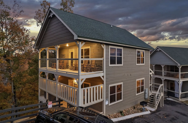 The Bear Den  *Book One Week And Save* - Experience the best of both worlds at The Bear Den! Splash around in your private heated indoor pool or relax in the hot tub after a fun day exploring the majestic Smoky Mountains. Located just 1.5 miles from the Parkway and a short 15-minute drive to Gatlinburg or Dollywood, our cabin offers tranquility and fun for the whole family!

This cabin features 4 bedrooms and 4.5 bathrooms. Three of the bedrooms have king size beds. One bedroom is a bunk room. There is also a queen sofa bed in the living room.
You can feel safe knowing the pool area is secured with a locking half door at the top of the stairs heading down to the pool. There is also a pool alarm to detect any possible movement when the pool is not in use.

Have endless fun with arcade games or relax on one of three balconies ideal for gathering together and unwinding. With Spectrum cable/WiFi and access to all your favorite streaming apps (BYOP), your stay promises entertainment and comfort.

The cabin has space for 2 cars maximum. Look for the parking signs for 867 Osprey Way only. There is no street parking permitted.