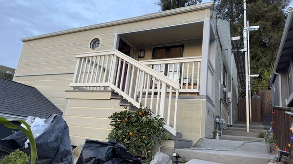 Oakland CA - This remodeling was done with replacing the old siding, installing new insulation R15, installing a half inch plywood, brand new weather barrier, and a premium James Hardy artisan lap Siding. The home will be painted to the customer choice of color.