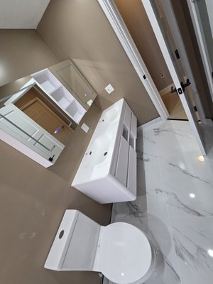 Bathroom Remodel - Another stunning transformation! 🚿✨ We took this bathroom down to the studs, removing outdated finishes and worn fixtures. The space was rebuilt with new framing, insulation, and modern waterproofing, then finished with sleek porcelain tile, a floating double vanity, upgraded lighting, and a glass shower with bold matte black fixtures. The result is a bright, spacious, and spa-like retreat that blends durability with modern design. Bathroom Remodel - Another stunning transformation! 🚿✨ We took this bathroom down to the studs, removing outdated finishes and worn fixtures. The space was rebuilt with new framing, insulation, and modern waterproofing, then finished with sleek porcelain tile, a floating double vanity, upgraded lighting, and a glass shower with bold matte black fixtures. The result is a bright, spacious, and spa-like retreat that blends durability with modern design.