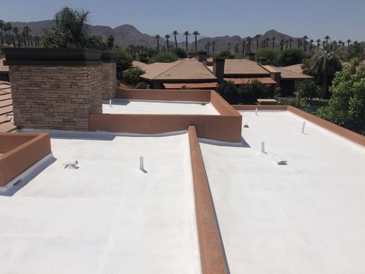 Spray Foam Roof Installation for Custom Home in La Quinta, CA - VRS removed all the rocks from the existing cap sheet roof, then applied polyurethane spray foam directly over the surface, enhancing the property's ability to stay insulated, cool, and energy-efficient. Spray Foam Roof Installation for Custom Home in La Quinta, CA - VRS removed all the rocks from the existing cap sheet roof, then applied polyurethane spray foam directly over the surface, enhancing the property's ability to stay insulated, cool, and energy-efficient.