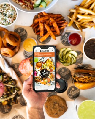 The Stand App…Rewards Redefined - No matter where you are - be it at home, in the office, or on the move - utilize our app to pre-order and skip the queue or get it delivered to your door. By doing so, you'll not only accumulate points for exciting rewards but also enjoy complimentary food. Embrace the benefits of being a member of The Stand App, which grants you access to exclusive news, promotions, and special offers. Enroll now and receive an extra 70 bonus points, valid for a delicious regular Stand Fry. Begin your journey towards earning points today by downloading our app and joining our exclusive loyalty program. Don't miss out on this limited-time opportunity and start earning points today!