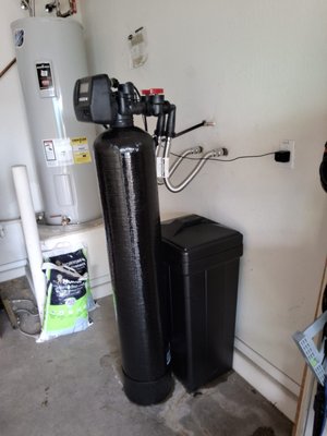 Water Softener Installed Starting at $1,699.00 (if pre-looped for system) - Bluefrog Plumbing and Drain of North Phoenix offers all the top brands of new water softeners with pricing starting at only $1,699.00 including installation. Pricing includes the installation of a water softener into a pre-installed hookup loop for a soft water treatment system but does not include plumbing a home that is not set up for water softening system.
Water softeners remove calcium and magnesium ions from hard water, providing numerous benefits:
Improved Water Quality:
Softer water for bathing, showering, and washing clothes
Reduced mineral buildup on fixtures, appliances, and dishes
Clearer, more palatable drinking water
Enhanced Cleaning:
Less soap and detergent needed for cleaning
Easier removal of soap scum and mineral deposits
Brighter, more vibrant laundry
Reduced Energy Costs:
Less mineral buildup in pipes and appliances, improving efficiency
Reduced need for hot water to dissolve soap and remove deposits
Prolonged Appliance Life:
Protection from mineral scaling and corrosion, extending the lifespan of water heaters, dishwashers, washing machines, and more
Health Benefits:
Some studies suggest that soft water may improve skin and hair health
Reduced exposure to heavy metals and other contaminants that may be present in hard water
Environmental Benefits:
Reduced water usage due to improved cleaning efficiency
Decreased consumption of cleaning products
Other Advantages:
Improved taste and appearance of beverages
Reduced staining and discoloration of surfaces
Less time spent cleaning and maintaining appliances Water Softener Installed Starting at $1,699.00 (if pre-looped for system) - Bluefrog Plumbing and Drain of North Phoenix offers all the top brands of new water softeners with pricing starting at only $1,699.00 including installation. Pricing includes the installation of a water softener into a pre-installed hookup loop for a soft water treatment system but does not include plumbing a home that is not set up for water softening system.
Water softeners remove calcium and magnesium ions from hard water, providing numerous benefits:
Improved Water Quality:
Softer water for bathing, showering, and washing clothes
Reduced mineral buildup on fixtures, appliances, and dishes
Clearer, more palatable drinking water
Enhanced Cleaning:
Less soap and detergent needed for cleaning
Easier removal of soap scum and mineral deposits
Brighter, more vibrant laundry
Reduced Energy Costs:
Less mineral buildup in pipes and appliances, improving efficiency
Reduced need for hot water to dissolve soap and remove deposits
Prolonged Appliance Life:
Protection from mineral scaling and corrosion, extending the lifespan of water heaters, dishwashers, washing machines, and more
Health Benefits:
Some studies suggest that soft water may improve skin and hair health
Reduced exposure to heavy metals and other contaminants that may be present in hard water
Environmental Benefits:
Reduced water usage due to improved cleaning efficiency
Decreased consumption of cleaning products
Other Advantages:
Improved taste and appearance of beverages
Reduced staining and discoloration of surfaces
Less time spent cleaning and maintaining appliances