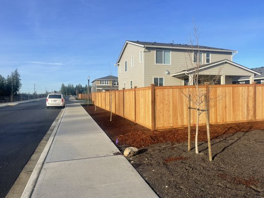 Wooden cedar fence new construction houses - This is new construction houses areas where wooden traditional fence style around 1200 linear feet Wooden cedar fence new construction houses - This is new construction houses areas where wooden traditional fence style around 1200 linear feet