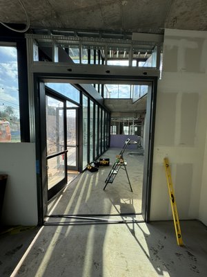Exterior/ Interior doors installation - Installation of doors in a building under construction. We install doors of any type: metal, wooden, and glass. We also handle the installation of windows. Exterior/ Interior doors installation - Installation of doors in a building under construction. We install doors of any type: metal, wooden, and glass. We also handle the installation of windows.